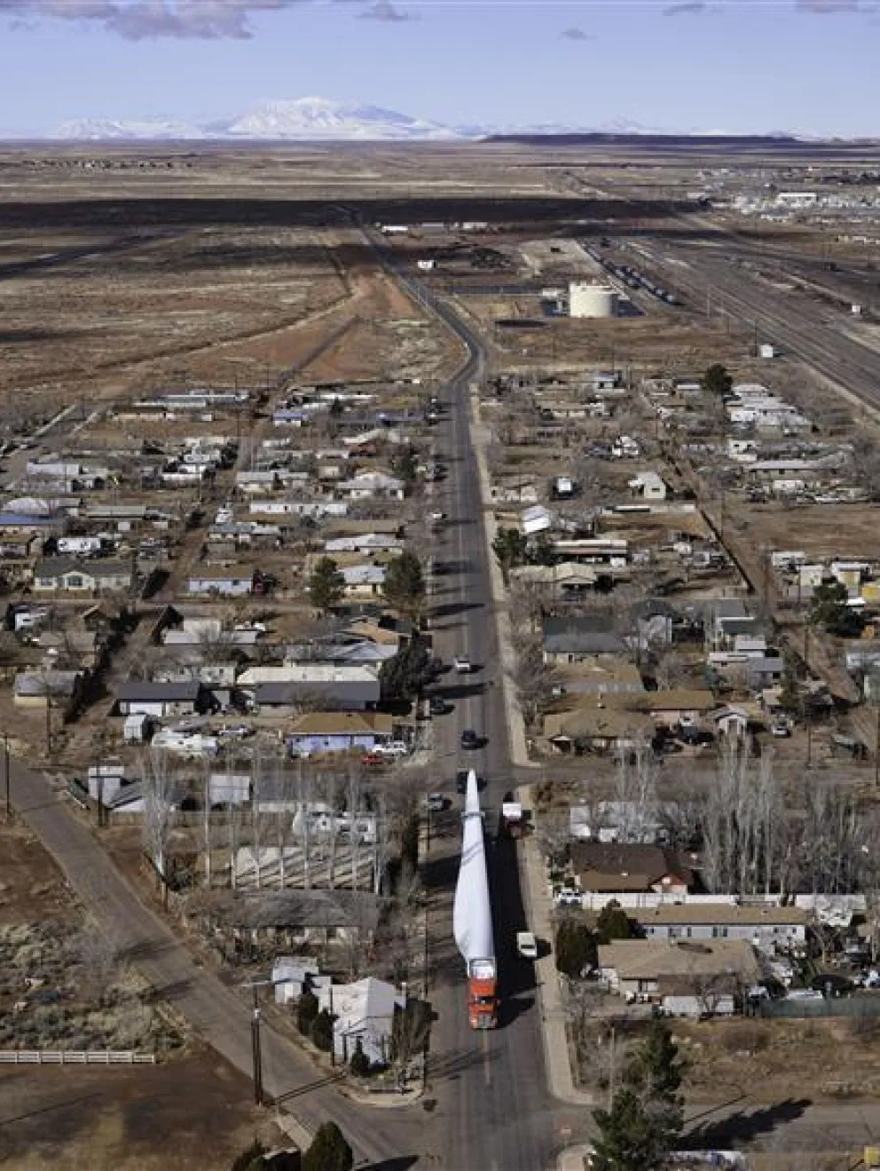 aerial-view-wind-turbine-blade-transport-small-town-west-camp-2.jpg