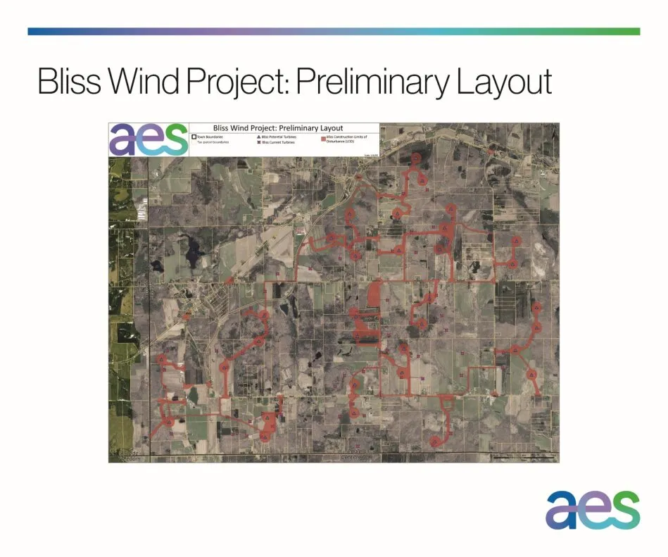 Map titled 'Bliss Wind Project: Preliminary Layout' showing an aerial view with red lines indicating boundaries and locations for proposed wind turbines. The map includes a legend and the AES logo at the top and bottom right corners.