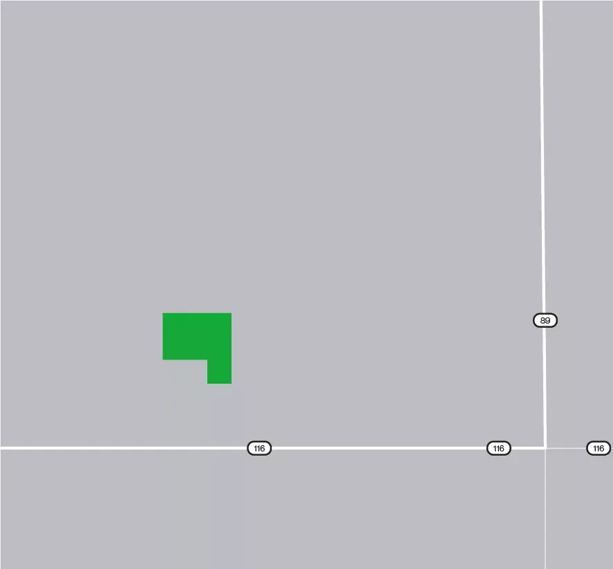 Map showing a green L-shaped area on a gray background intersected by white lines. The lines are labeled with numbers 89 and 116.