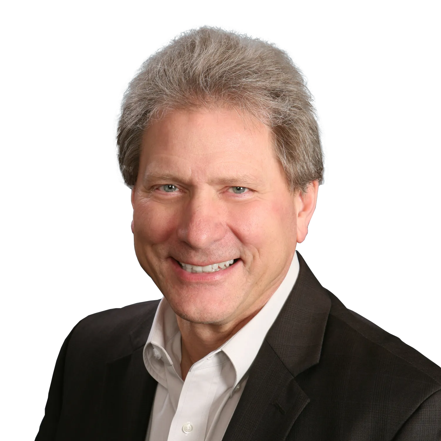 Smiling man with gray hair wearing a dark suit jacket and white shirt against a black background.