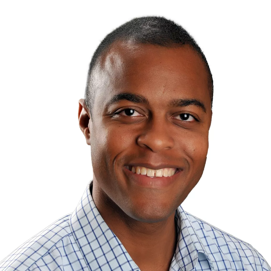 A person smiling at the camera, wearing a blue and white checkered shirt, against a plain white background.