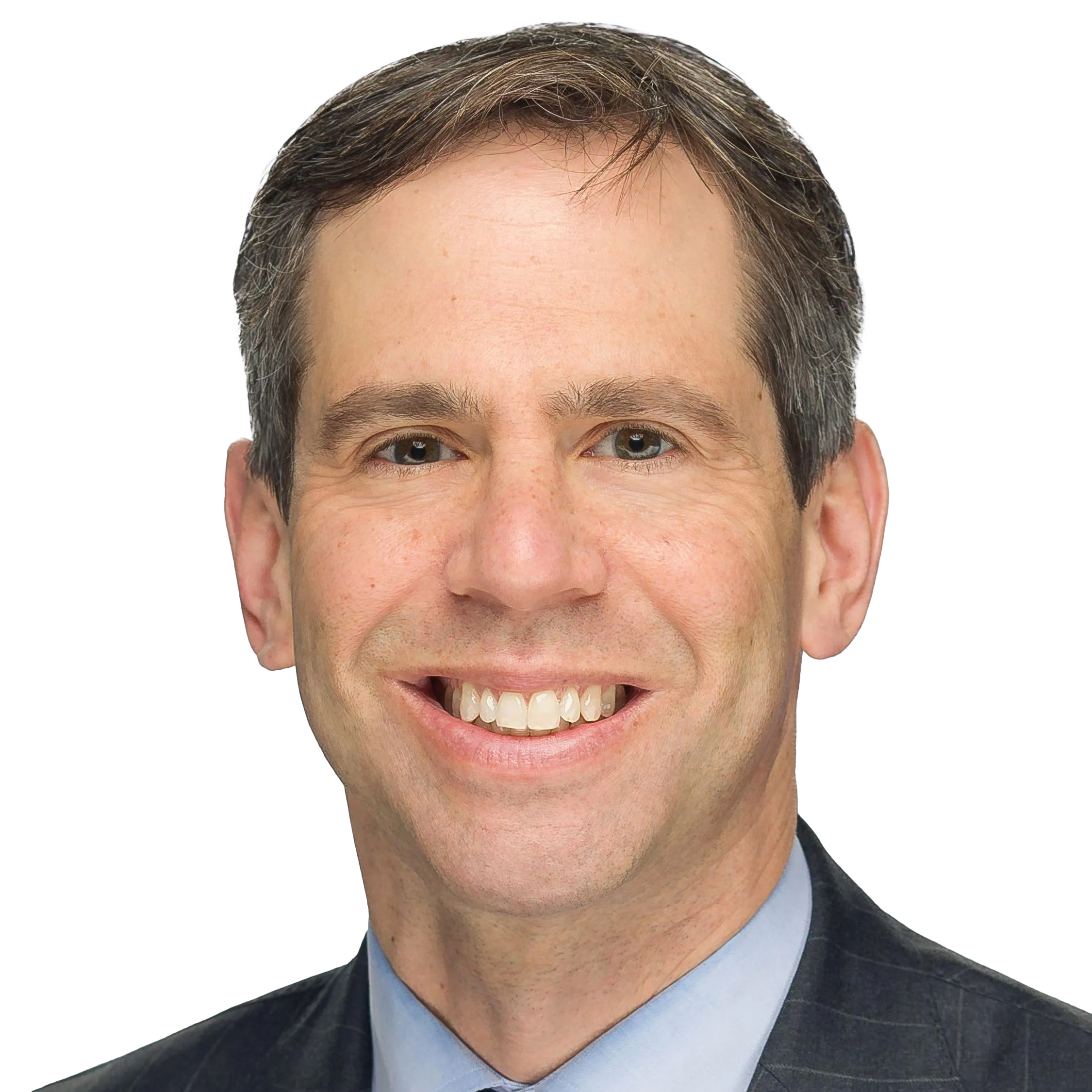 Professional headshot of AES' Paul Freedman with short brown hair wearing a dark suit jacket and light blue shirt, photographed against a plain background.