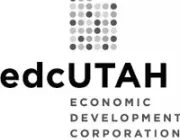 Logo of Economic Development Corporation of Utah with a grid of gray dots forming a stylized 'L' above the text 'edcUTAH' and 'Economic Development Corporation of Utah' below.