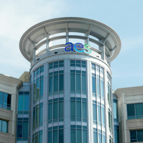 AES employees working together in a modern office environment, symbolizing global collaboration and innovation in sustainable energy